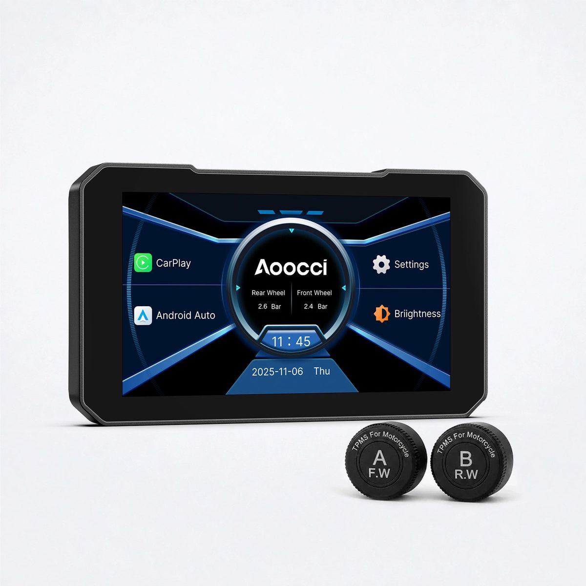 Compact black AOocci C3 5-inch motorcycle touch screen, the C3 Plus variant, against a white background, its display showing a blue central AOocci dashboard with CarPlay and Android Auto options at the left edge, a circular front and rear tire-pressure readout of 2.4 and 2.6 bar, and the date 2025-11-06; two round valve-cap TPMS sensors labeled A F.W and B R.W sit in front