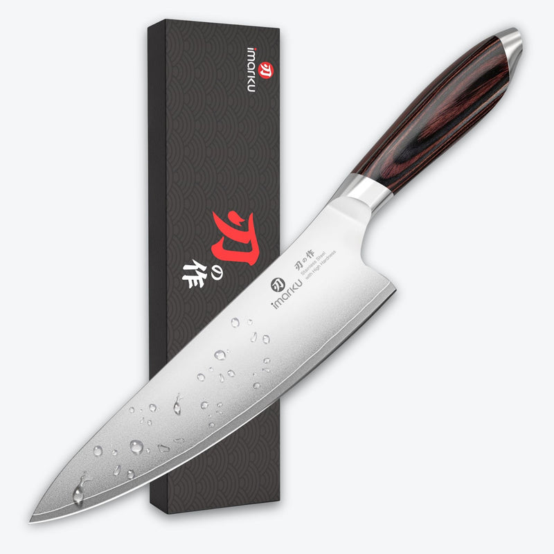 The iMarku TS01 8-inch chef knife on a dark plate against a white background