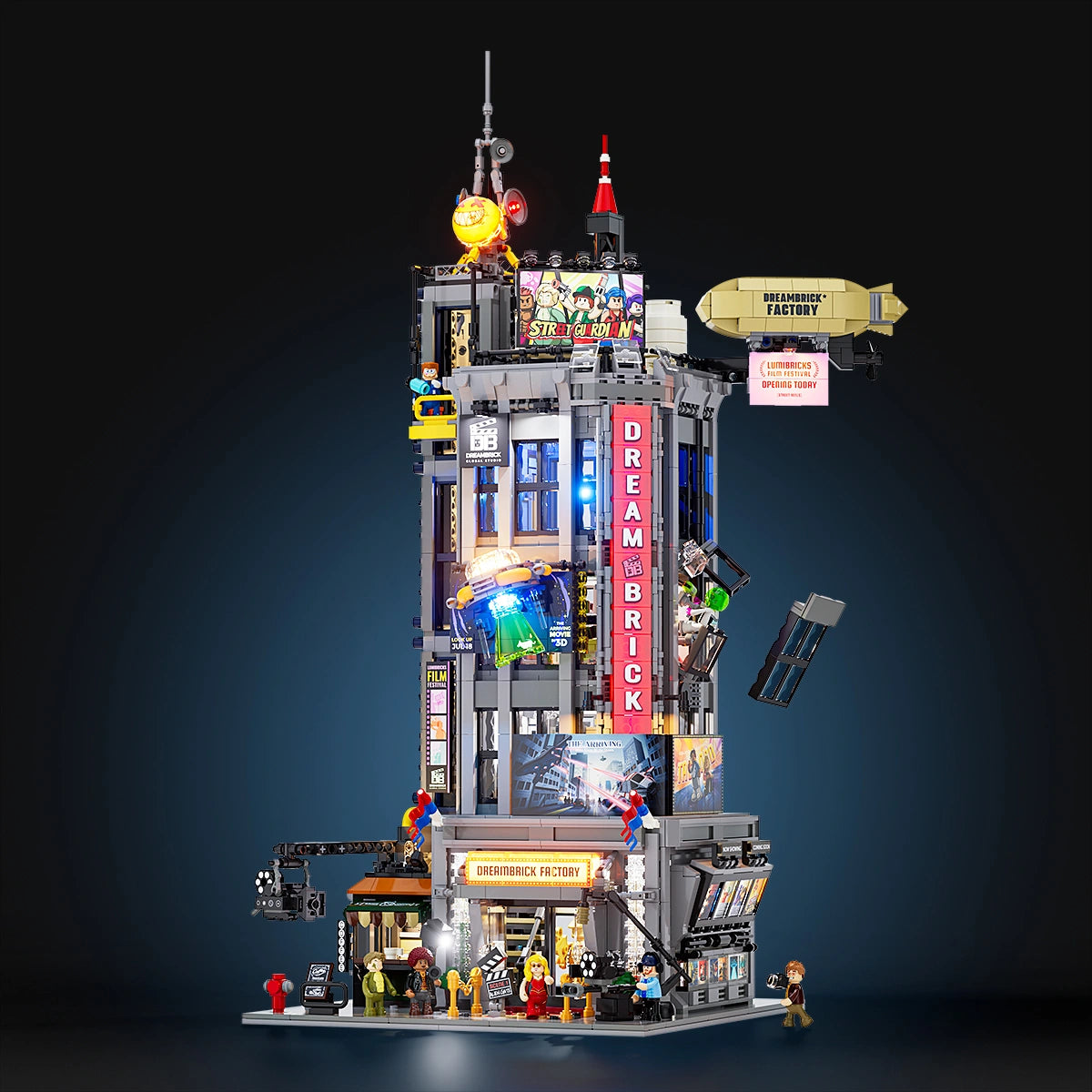 Lumibricks Film Studio Tower 19015 brick-built studio tower with lit floors and minifigures, on a dark studio background