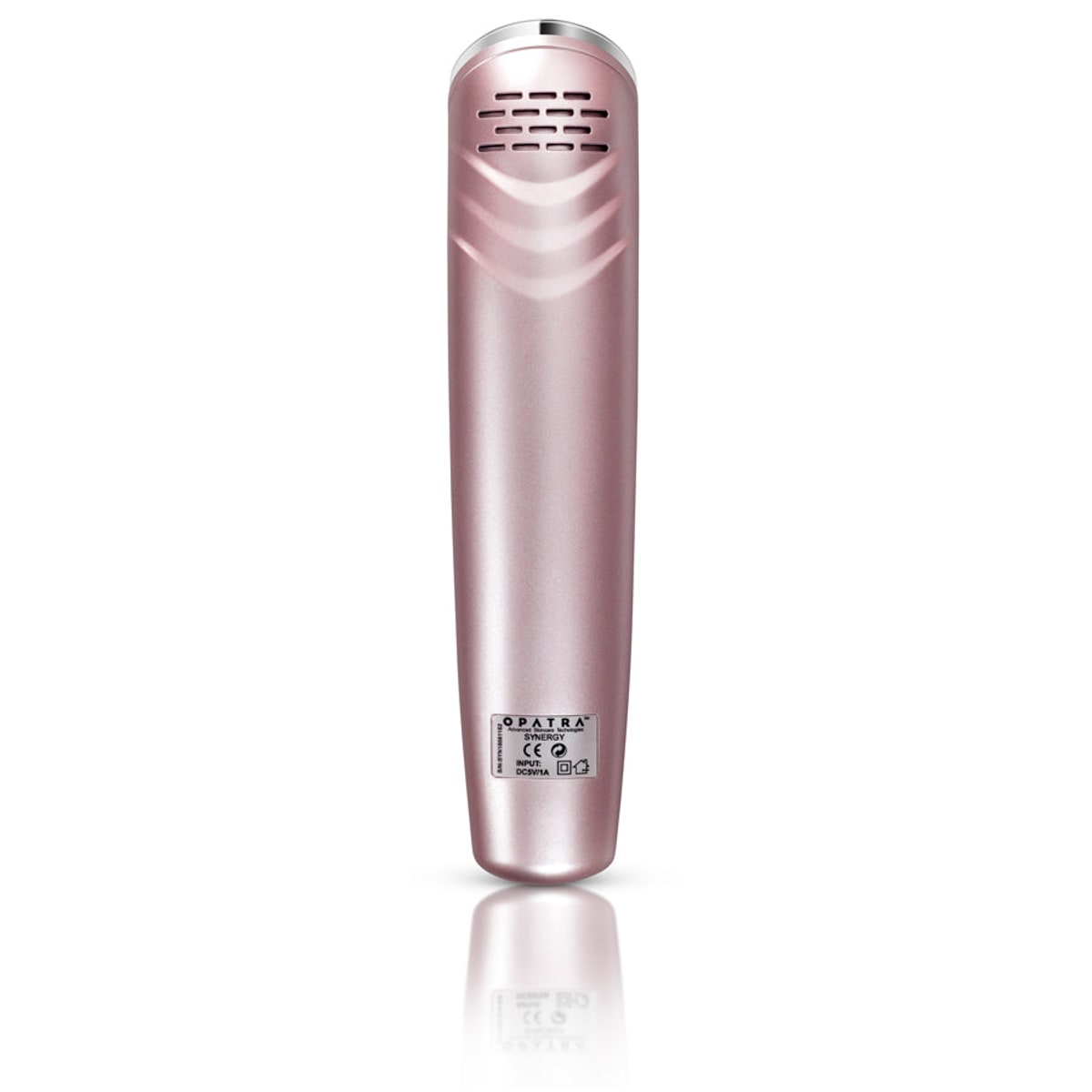 A rose-gold OPATRA Synergy Face device standing upright on a white background, its curved, ridged metal applicator surface angled toward the camera and a small white label lower on the body