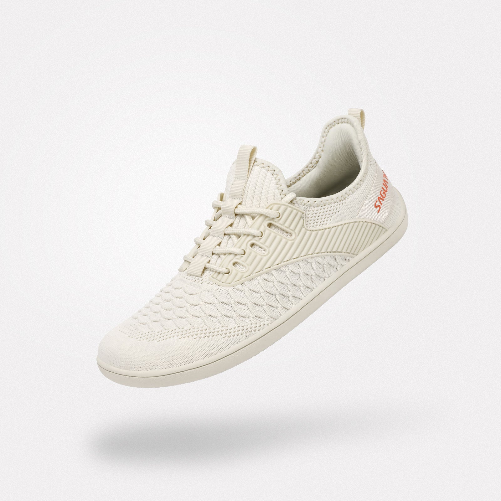 Saguaro Go I off-white knit barefoot shoe with a laced closure