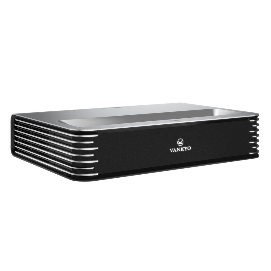Low, wide silver-and-black VANKYO ultra-short-throw projector shown in three-quarter view against a white background; the silver top is glossy, the visible side has horizontal vent slats, and the black speaker grille on the front carries the VANKYO wordmark
